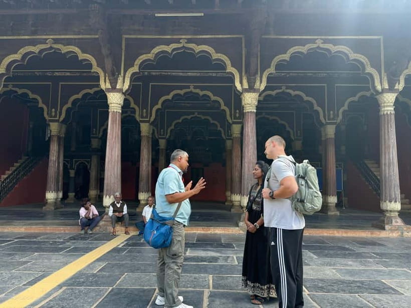 Bangalore: Palace, Temples, Fort & Markets Walking Tour - Jain temple time: quiet carvings, and the dress code that keeps it respectful