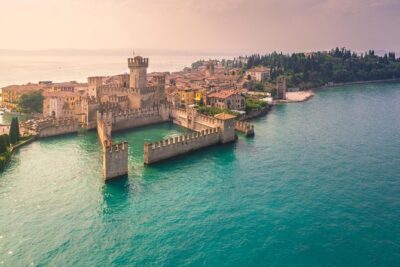 Castles boat tour with Bardolino wine tasting and nibbles - First castle sightings, a spa stop, and Roman ruins—how the early segment works