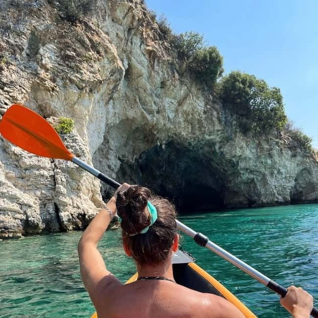 Caves of Porto Palermo: Kayak/SUP Tour with Castle Sea View - Rounding the bay: cliffs, quieter beaches, and another swim window