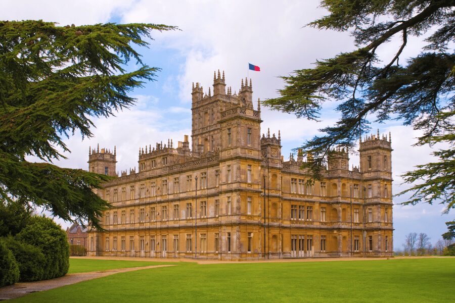 Downton Abbey Filming Locations & Highclere Castle Tour - The Downton village walk in Bampton: Cottage Hospital, church, and Crawley exteriors