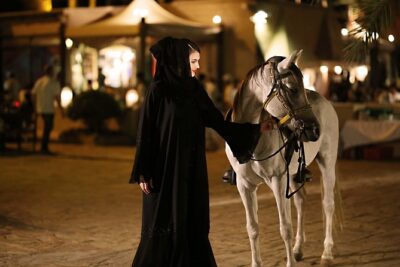 Dubai: Luxury Desert Fortress Dinner, Camel Ride & Live Shows - Camel rides, henna, and falcons: the cultural part that actually feels hands-on