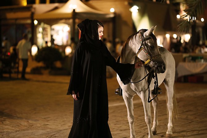 Dubai: Luxury Desert Fortress Dinner, Camel Ride & Live Shows - Camel rides, henna, and falcons: the cultural part that actually feels hands-on