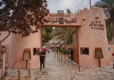 From Abu Dhabi: Grand Mosque, Royal Palace& Heritage Village - Pickup, the Corniche drive, and that skyline intro near Etihad Towers