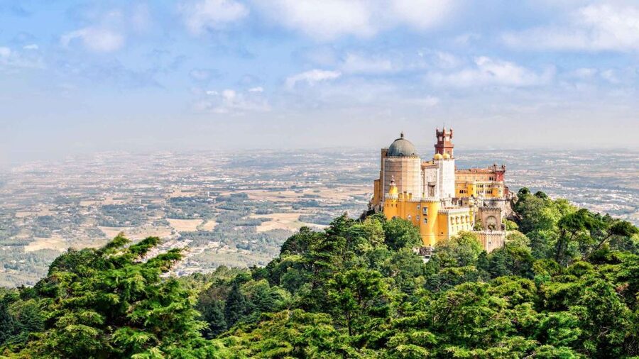 From Lisbon: Pena Palace, Regaleira, Sintra & Cascais Tour - Quinta da Regaleira: Moorish Castle Vibes and Proper Garden Time