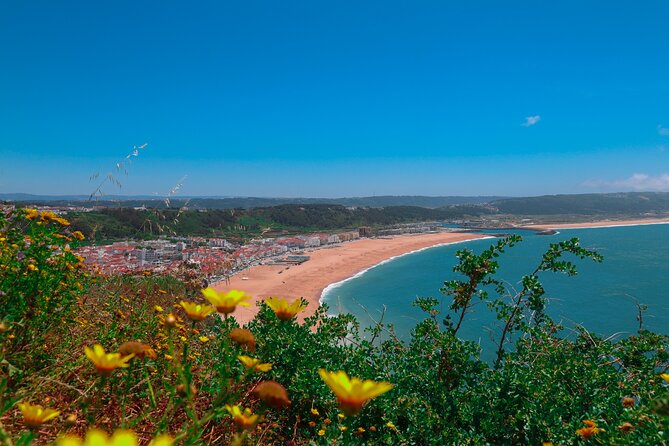 From Lisbon: Small Group to Pena Palace, Nazaré & Fátima - A 9-hour overview of Portugal: spiritual Fátima, wave-hunting Nazaré, Sintra views