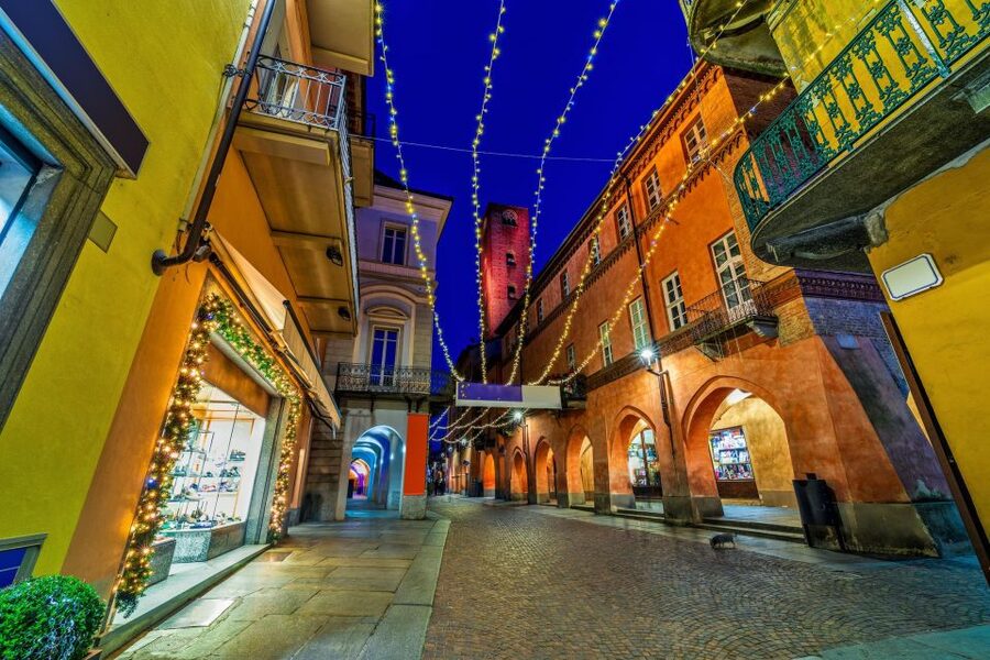 From Milan: Barolo Wine Tasting, Alba Tour and Castle Visit - Enoteca and extra glass time: history in a wine shop setting