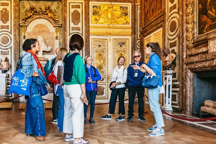 From Paris: Skip-the-Line Palace of Versailles Bike Tour - Versailles town market, cheese tasting, and buying lunch like a local