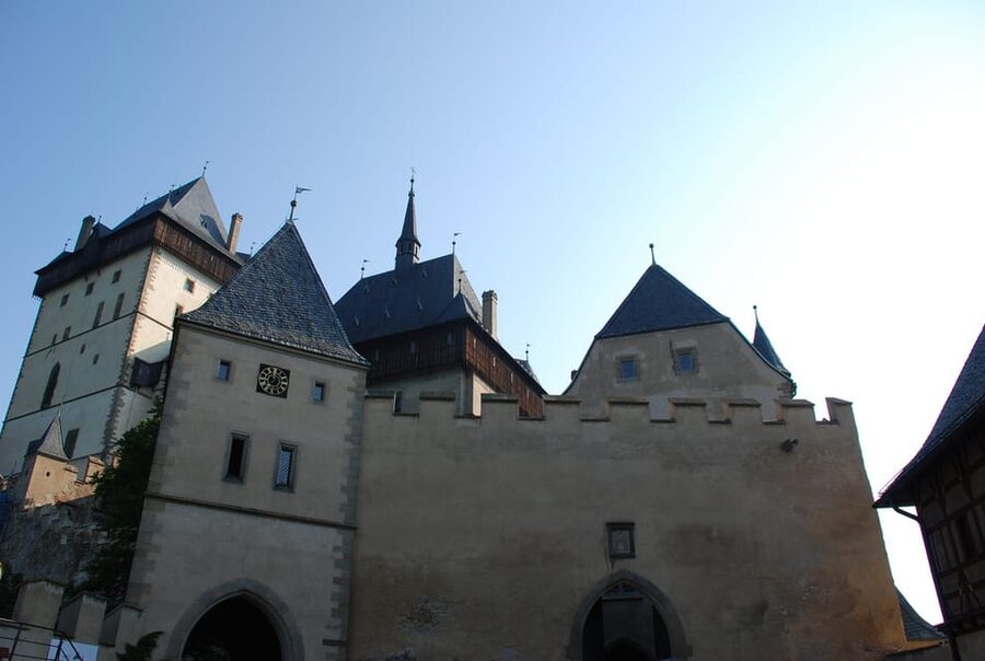 From Prague: Karlstejn Castle Skip-the-Line Ticket and Tour - Imperial Palace and the Well Tower: where daily life meets ceremony