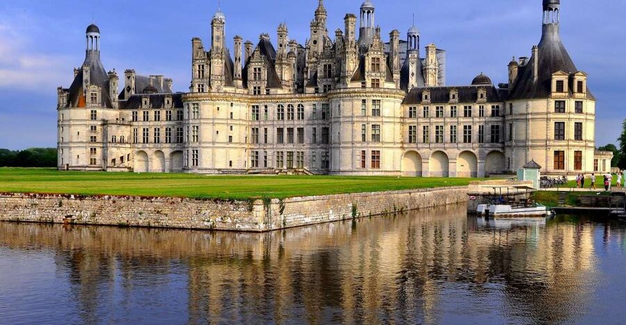 From Tours: Chenonceau and Chambord Castles Guided Tour - Château de Chambord: moat views and the double helix staircase