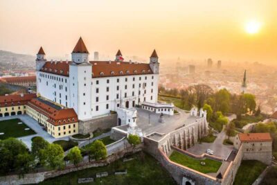 From Vienna: Bratislava with Local Guide, Castle & UFO Views - Bratislava Castle: photos, walking time, and the Tuesday issue