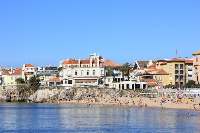Full-Day Private Sintra Tour with Wine Tasting and Pena Palace - A dune beach stop on the return: surf energy on the way back