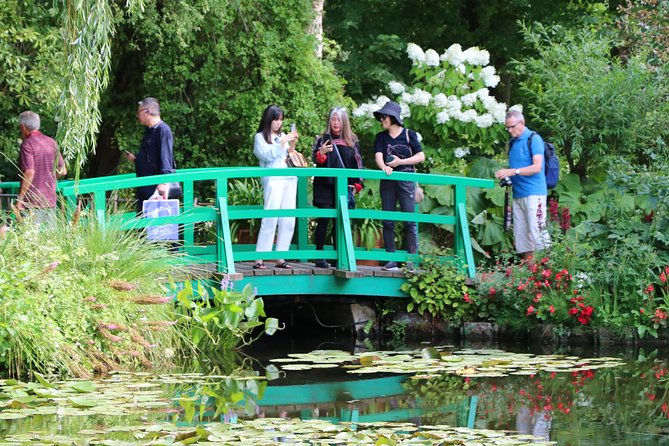Giverny's House & Gardens plus Versailles Palace Day Trip with Lunch from Paris - Fondation Claude Monet: house, lily ponds, and that Japanese-style bridge