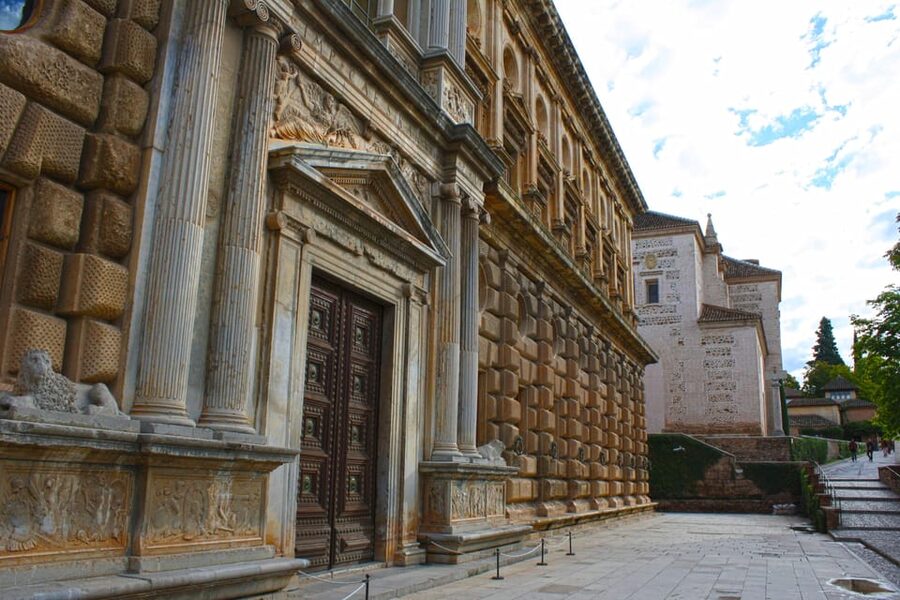Granada: Alhambra and Charles V Palace Tour - Inside the fortress: monumental Gate of Justice, views, and the “daily life” layer