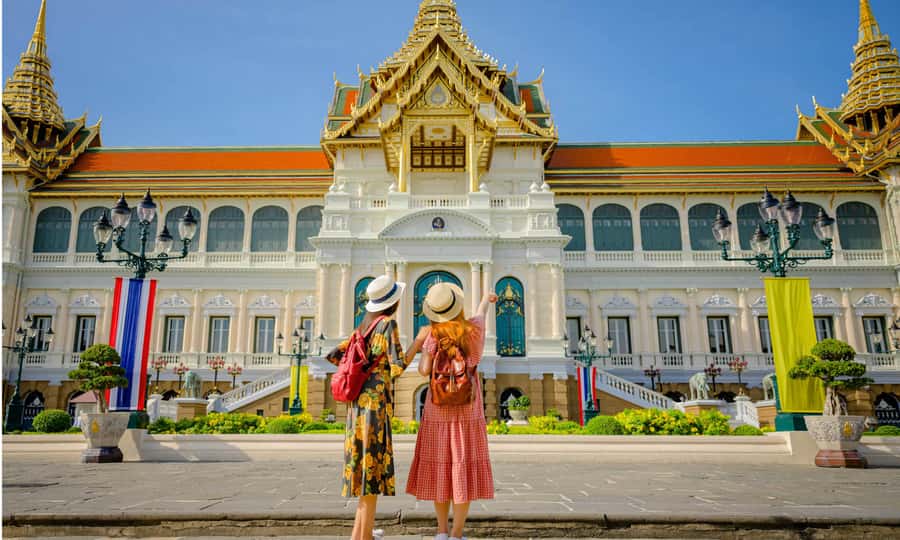 Grand Palace, Damnoen Floating Market & Maeklong Market Tour - Damnoen Saduak Floating Market: boats, canals, and buying smarter