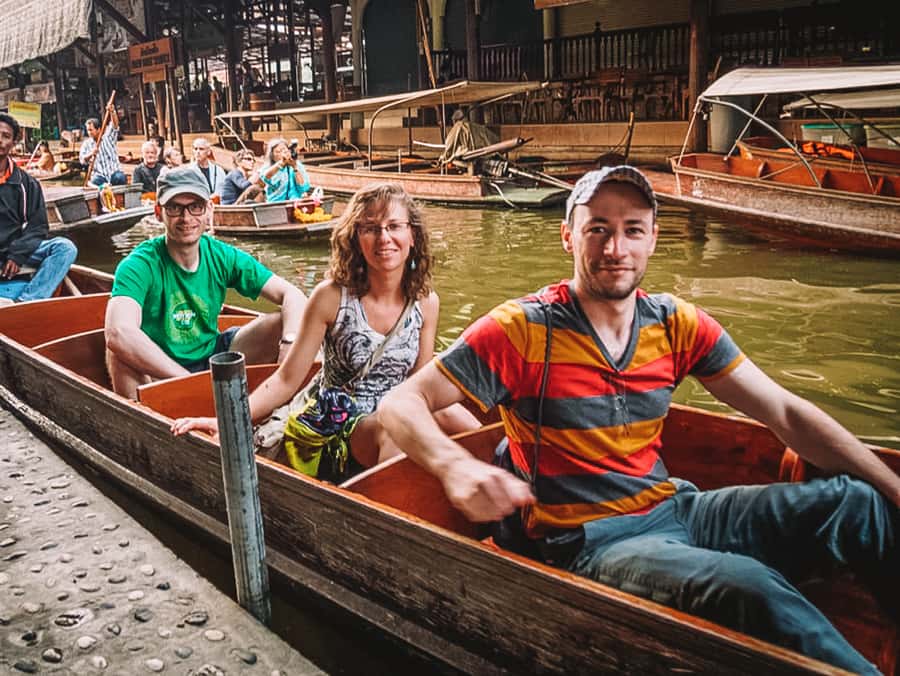 Grand Palace, Damnoen Floating Market & Maeklong Market Tour - Maeklong Railway Market: Talat Rom Hup in action