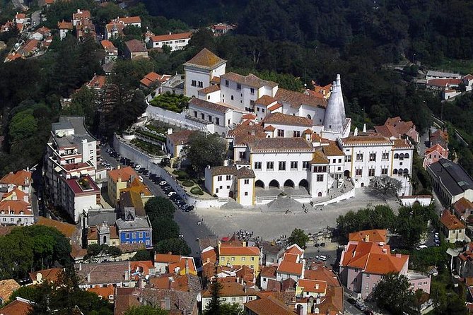 Group to Pena Palace, Sintra (pass by Regaleira) and Cascais - Cabo da Roca in 20 minutes: westernmost Europe with a film connection