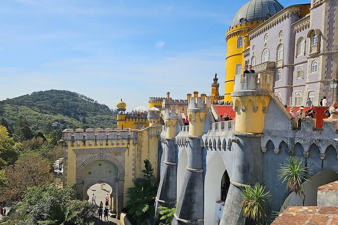 Group Tour to Sintra, Pena, Regaleira, Cabo da Roca & Cascais - Pena Palace on the Hill: Views, Color, and Ticket Reality