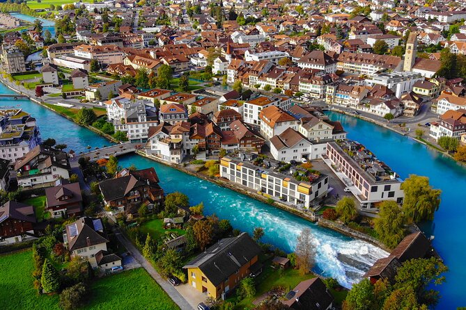 Interlaken Valley E-Bike Tour: Rivers, Lakes, Forests & Castles - Lake Thun photo stop with distant Niesen mountain lines