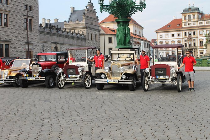 Karlstejn Castle in Vintage Convertible Car - The Vintage Convertible Ride: Fun, Fast, and Weather-Sensitive