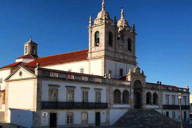 Knights Templar Castle, Nazaré & Óbidos️ Private Day Tour - Stop 2: Nazaré’s coastline, fishing-village feel, and the big-wave legend