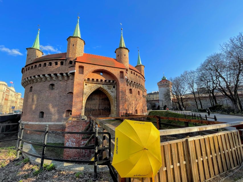 Kraków: Old Town & Wawel Castle Walking Tour in English - The Barbican, city walls, and the Royal Route rhythm