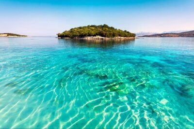 Ksamil Blue Eye and Saranda Day Tour from Tirana Durres Golem - Stop 1: Ksamil and Saranda—sea views, seaside strolling, and beach reality checks