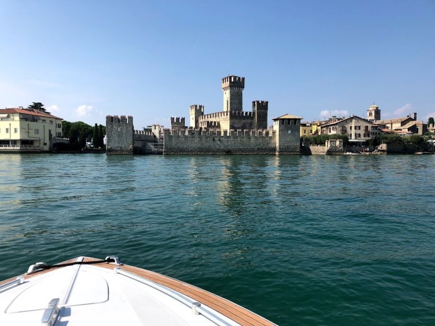Lake Garda: Historic Castle Cruise with Wine Tasting - Villa Canossa swim stop: how to make the water break worth it