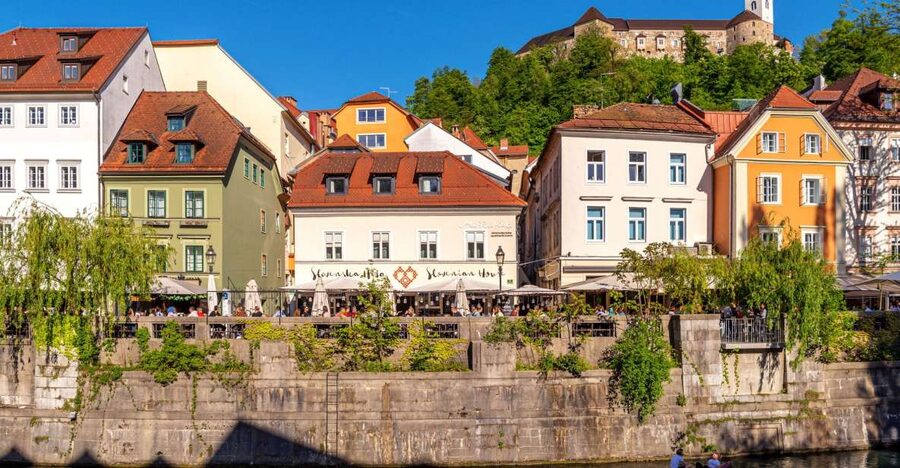 Ljubljana: Guided Walk & Funicular Ride to Ljubljana Castle - Entering the Old Town Like a Local: Town Hall to Ljubljana’s Core