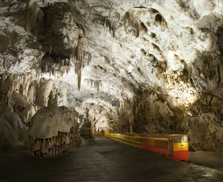 Ljubljana: Postojna Cave & Predjama Castle Tickets and Tour - Predjama Castle: Renaissance architecture on a cliff face