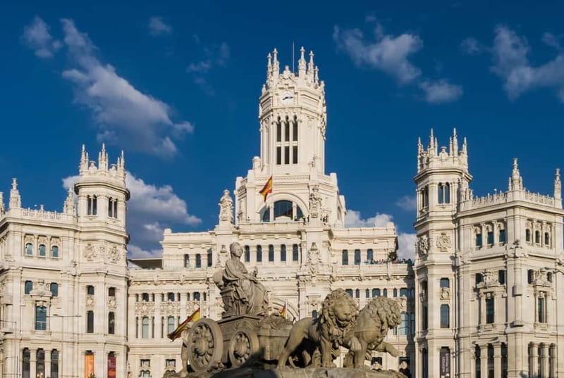 Madrid: Old Town, Poets District, and Royal Palace Tour - Plaza Mayor Power: Arco de Cuchilleros and the Main Square Feel