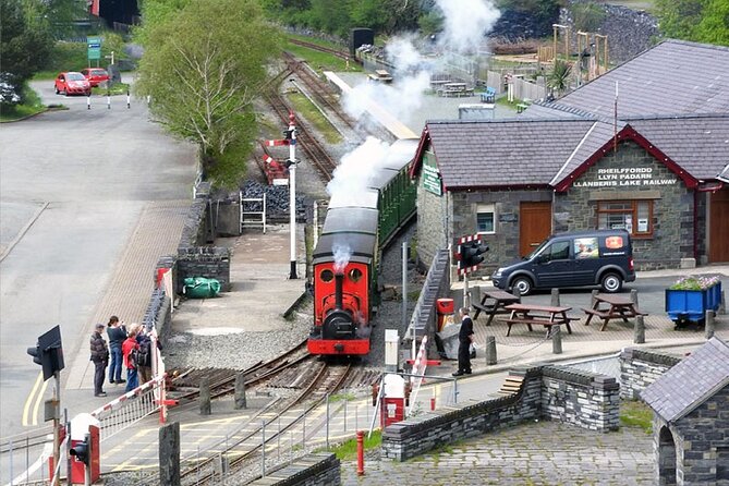 North Wales & Caernarfon Castle Full-Day Tour from Manchester - Snowdonia road views plus Llyn Ogwen and the Excalibur tie-in