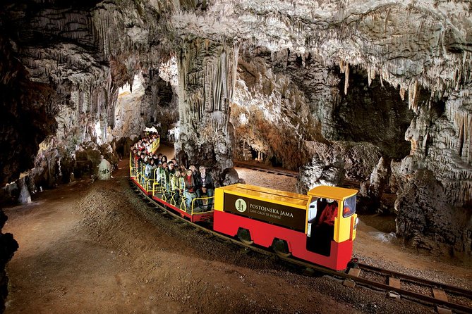 Postojna Cave and Castle Small-Group Day trip from Ljubljana - Predjama Castle in the Cave Mouth: Renaissance Rooms and the Erasmus Legend