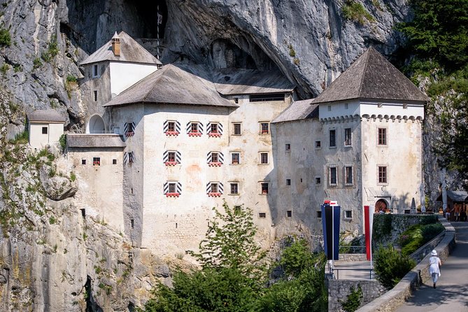 Postojna Cave & Photostop Predjama castle - Group Tour from Koper - Vehicle comfort and group size: small on the road, larger in the cave