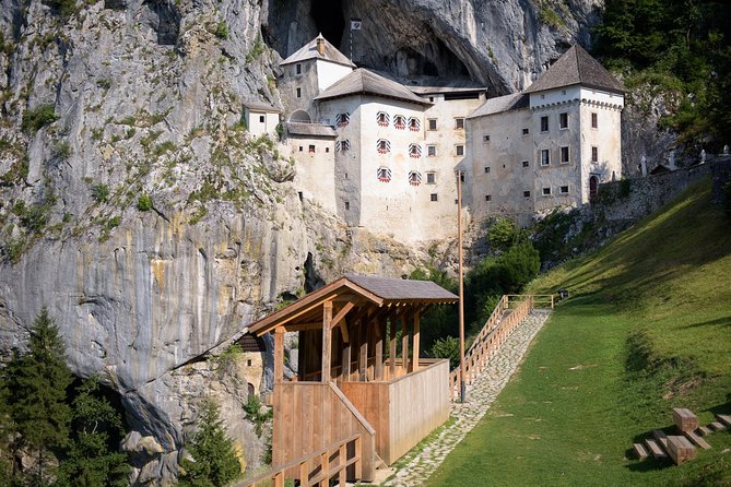 Postojna Cave & Photostop Predjama castle - Group Tour from Koper - Predjama Castle photo stop: a quick look at a big legend