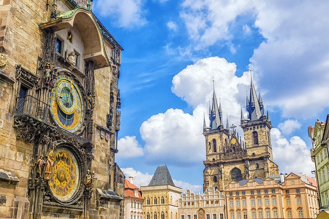 Prague: Grand City Tour with Bus, Castle exteriors & River Cruise - Vltava River Cruise Option: Prague Slows Down