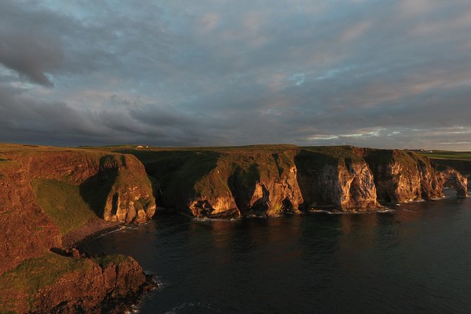 Private Tour: Giant's Causeway, Norman Castles, and Game of Thrones Film Locations - Dunluce Castle: 13th-century ruins and Greyjoy connections