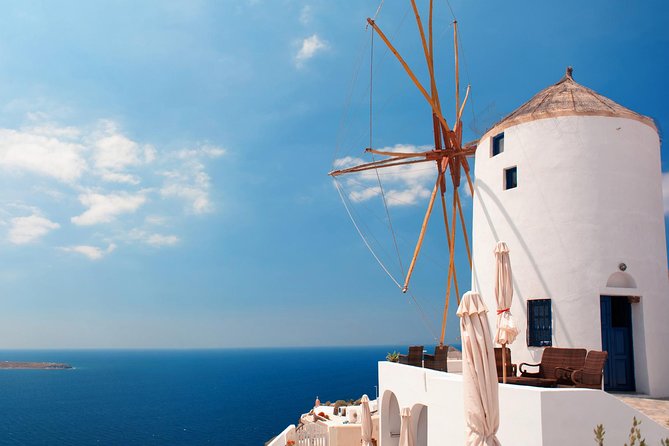Santorini Highlights and Venetian Castles Small-Group Day Tour - Perissa/Perivolos black-sand beach time: swim, relax, and optional lunch