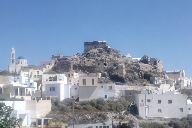 Santorini Highlights and Venetian Castles Small-Group Day Tour - Firostefani photo stop: Blue Dome and the Rock of Skaros