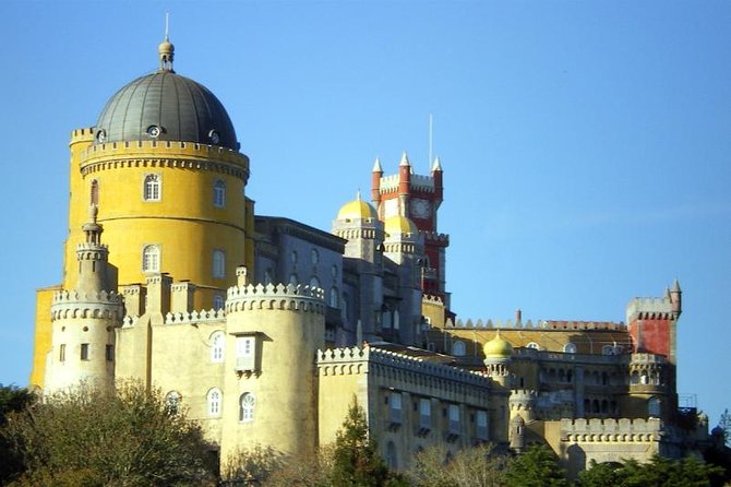 Sintra & Cascais Day Tour with Pena Palace Entry and Gardens Walk - Sintra village free time: pastries, souvenirs, and a real lunch window
