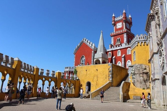 Sintra Cascais Private Tour with Pena Palace and Mouros Castle - Palácio da Pena and Pena Park: Romanticism on a Mountain