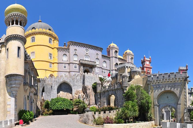 Sintra, Pena Palace, Quinta da Regaleira & Cascais Group Tour - Cascais + Estoril Drive-By: Easy Coastal Strolls and Casino Gardens