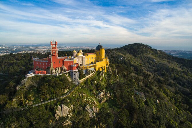 Sintra Private Tour with Tickets: Pena Palace & Moorish Castle - National Palace of Sintra Stop: Twin Chimneys and Village Icon Time
