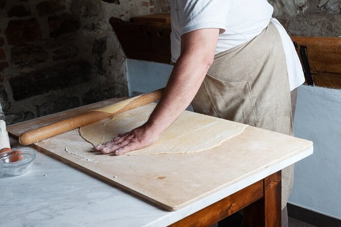 Small Group Pasta Making Class Wine Tasting in a Tuscan Castle - Pasta-making at the castle kitchen: tagliatelle and tagliolini