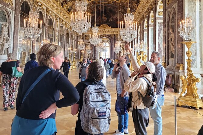 Versailles Palace Guided Tour with Gardens Access - Meeting at Versailles: Find Louis XIV, then flow with the group