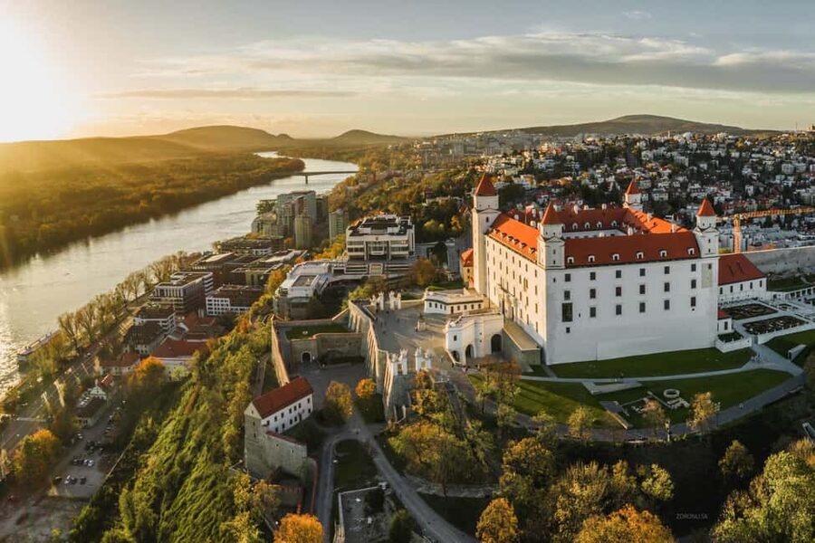 Vienna: Guided Bratislava & Devín Castle Tour via Hainburg - Devín Castle: ruins with a dramatic river setting