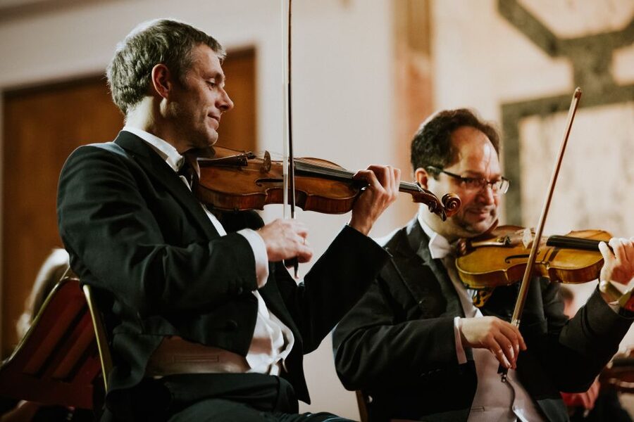 Vienna: Strauss and Mozart Concert at Hofburg Palace - Musical jokes and Viennese performance traditions